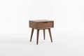 Walnut wood bedside table with one drawer and tapered legs